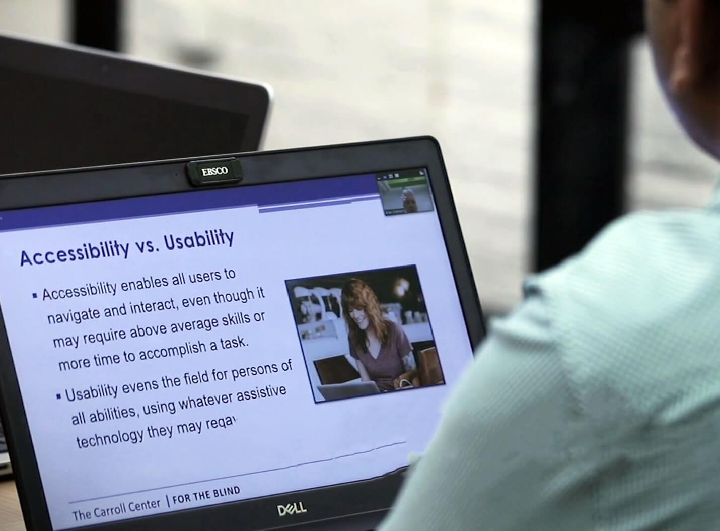 An EBSCO UX Designer learns about accessibility during a training session with the Carroll Center for the Blind's Accessibility Services Team.