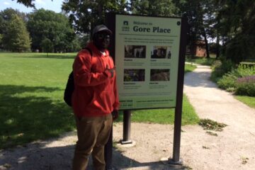 a student smiling during the field trip to Olin College
